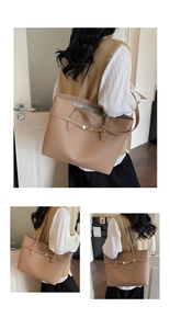 Close-up of brown litchi pattern leather tote with golden metal twist lock and straps