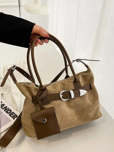 Brown faux suede Boston tote bag with decorative silver buckle and mini pouch accessory