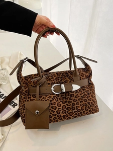 Chic leopard print suede tote bag with brown leather handles and mini hanging pouch