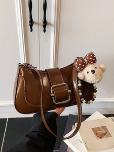 Retro brown patent leather underarm bag with silver buckle and cute teddy bear charm