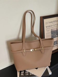 Chic camel lychee leather tote bag with gold metal buckle for stylish winter commuting