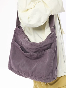 Large purple canvas tote bag with side pockets, crossbody style for women's daily commute