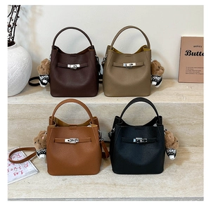 Litchi pattern bucket bags with metal turn-lock and cute teddy bear charms