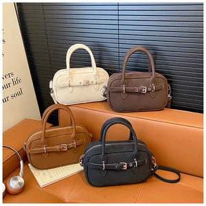 Detailed collection of vintage square handbags in white, brown, tan and black matte leather