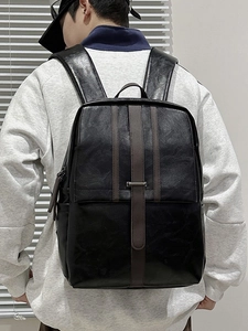 Business style black leather backpack with brown vertical stripe and wide straps