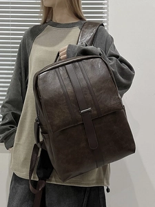 Classic dark brown leather laptop backpack with retro lychee texture for office and travel