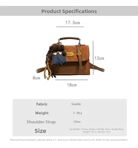 Brown frosted leather satchel with plush bear charm and detailed size specifications