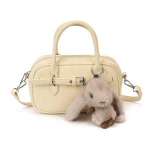 Cream vintage boston bag with lychee texture leather and plush rabbit keychain