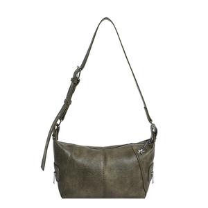 Detail of olive green vintage dumpling bag with star charm and distressed PU texture
