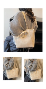 Macro shot of minimalist beige tote bag with pleated texture and stylish logo detail