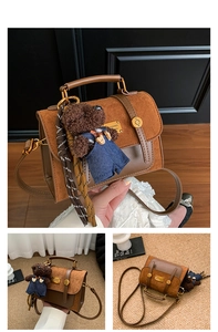 Detail of vintage brown patchwork crossbody bag featuring a cute plush bear charm
