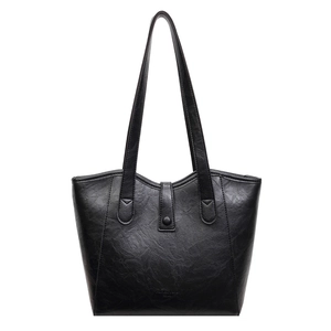 Classic black vintage tote bag in textured PU leather with Fashion Trend embossing