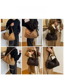 Detail showing versatile large tote bag with tassel in khaki and deep brown colors