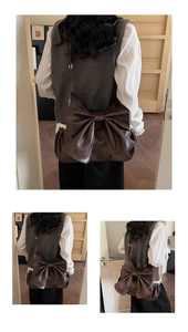 Detail of dark brown PU leather tote featuring large bow with delicate white lace trim
