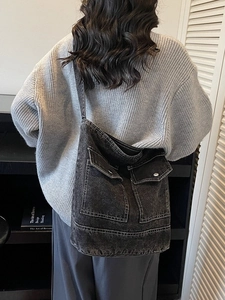 Large vintage washed denim tote bag for women with dual flap pockets and silver buckles