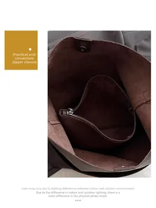 Detail of dark brown leather tote interior with zipper pocket and magnetic snap buckle