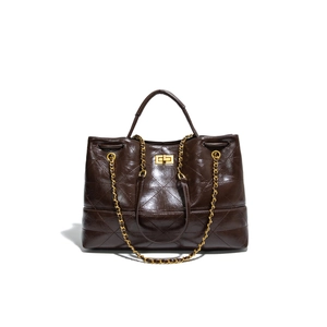 Deep brown quilted leather tote bag with gold chain strap and turn-lock closure
