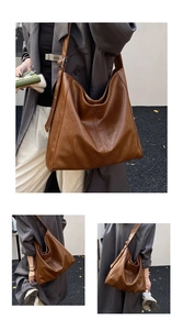 Detail of dark brown faux leather tote bag with soft texture and wide shoulder strap