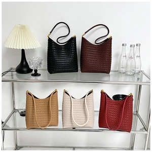 Minimalist woven tote bags for women in various colors with textured checkerboard pattern