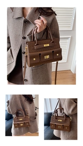 Détail du sac à main marron foncé tressé avec fermoir doré et bandoulière amovible
