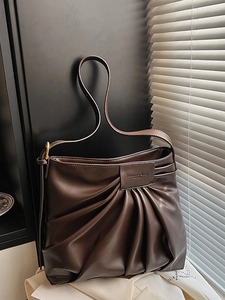 Minimalist large brown pleated leather tote bag for women commuting and casual wear
