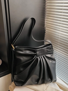 Large black pleated hobo tote bag in textured faux leather for daily commuting
