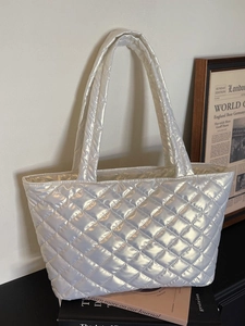 Quilted tote bag in pearl white metallic finish with large capacity and shoulder straps