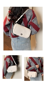 Detailed view of beige cowhide crossbody bag with pebble texture and metallic twist lock