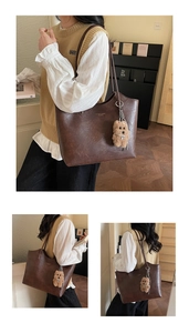 Detail of retro coffee tote bag with litchi texture leather and plush bear charm
