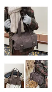 Detailed views of a vintage brown tote bag with metal eyelets and adjustable strap