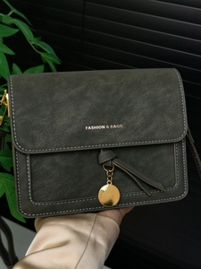 Green vintage small crossbody bag with matte finish and gold fashion lettering