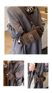 Detail of brown crescent bag showing contrast stitching and vintage multi-pocket design
