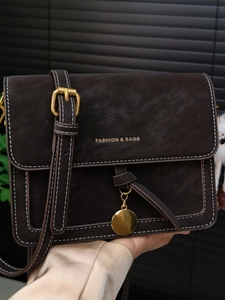 Retro dark brown crossbody square bag with white contrast stitching and gold hardware