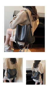 Detail of black leather bucket bag with white contrast stitching in a casual city style