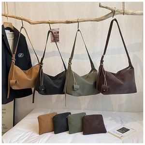 Minimalist matte leather hobo shoulder bags in camel, black, green, and brown with pouches
