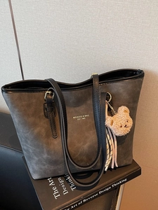 Retro grey matte tote bag with black leather shoulder strap and cute bear charm