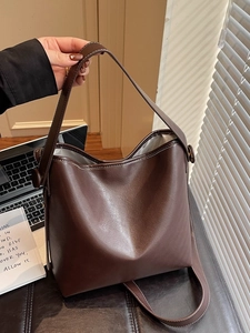 Vintage dark brown large bucket tote bag with white contrast stitching for daily commute
