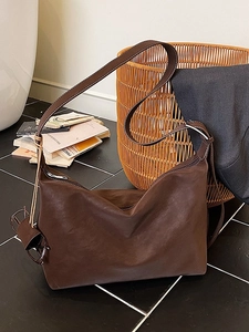 Large dark brown suede leather tote bag for women featuring long straps and silver zipper detail