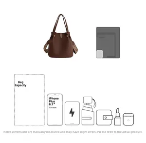 Brown leather bucket bag with silver buckle and ethnic pattern wide shoulder strap