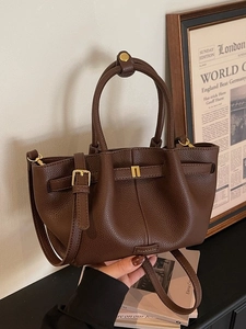 Brown litchi grain leather tote bag with pleated detail and adjustable shoulder strap