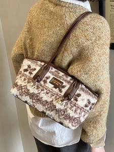 Brown fuzzy faux shearling tote bag for women with leather straps and large capacity