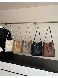 Detailed display of bucket bags in five colors featuring premium lychee grain leather texture