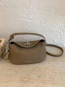 Khaki pebbled leather shoulder bag with silver hardware and adjustable strap