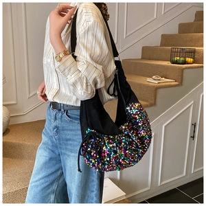Detail of colorful sequins and slouchy hobo design on this large crossbody tote bag