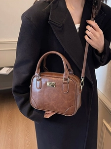 Vintage brown PU leather bowling bag with gold hardware and shoulder strap for women