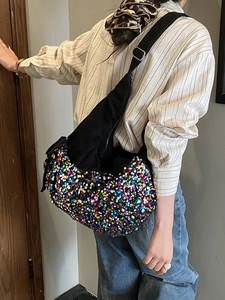 Fashionable crescent hobo bag with colorful sequins and adjustable black shoulder strap