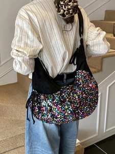 Fashionable crescent shoulder bag with colorful sequins and soft black suede fabric
