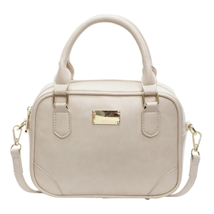 Retro light beige box-shaped tote bag with gold hardware and removable shoulder strap