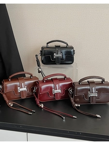 Collection of vintage leather handbags in black, reddish brown, burgundy, and dark coffee
