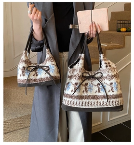 Close-up of fluffy jacquard tote bag set featuring snowflake patterns and leather bows